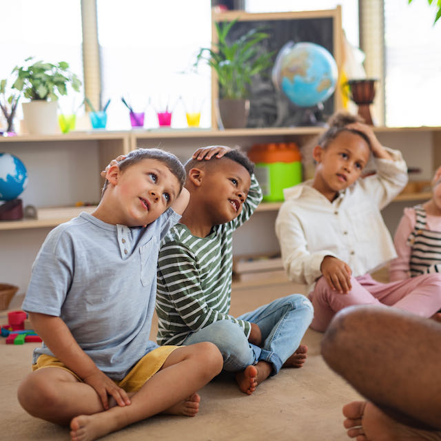 Children staying active and having fun while exercising at Learning Ladder Christian Preschool