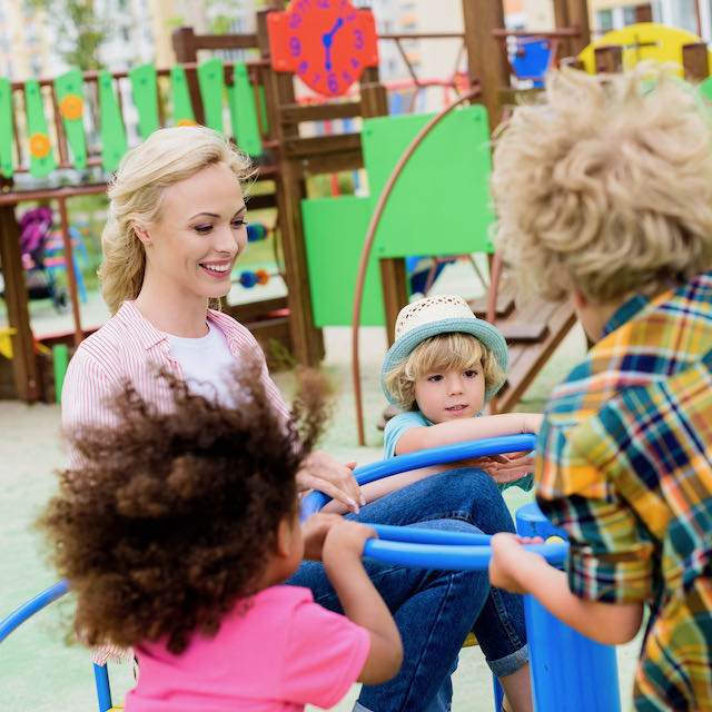 Children laughing and having fun while playing together at Learning Ladder Christian Preschool